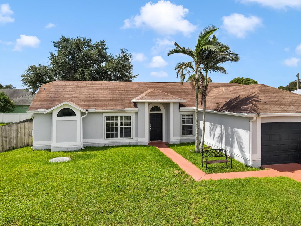 Photo of 1426 SW Dow Lane, Port Saint Lucie, FL 34953 (MLS # R11018289)