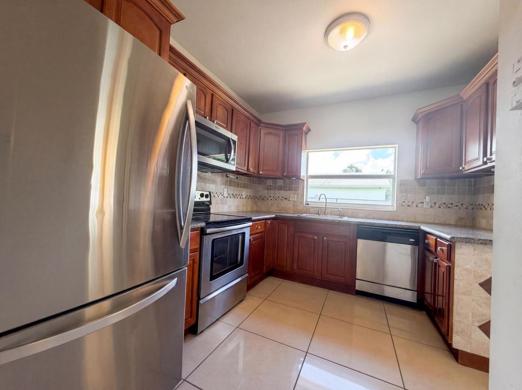 Photo of 453 N Deerfield Avenue, Deerfield Beach, FL 33441 (MLS # B26030872)