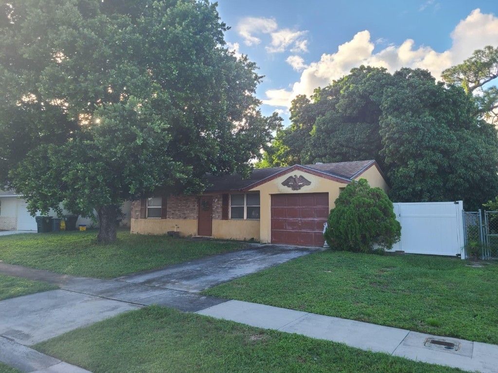 Photo of 4241 Centurian Circle, Greenacres, FL 33463 (MLS # F10538209)