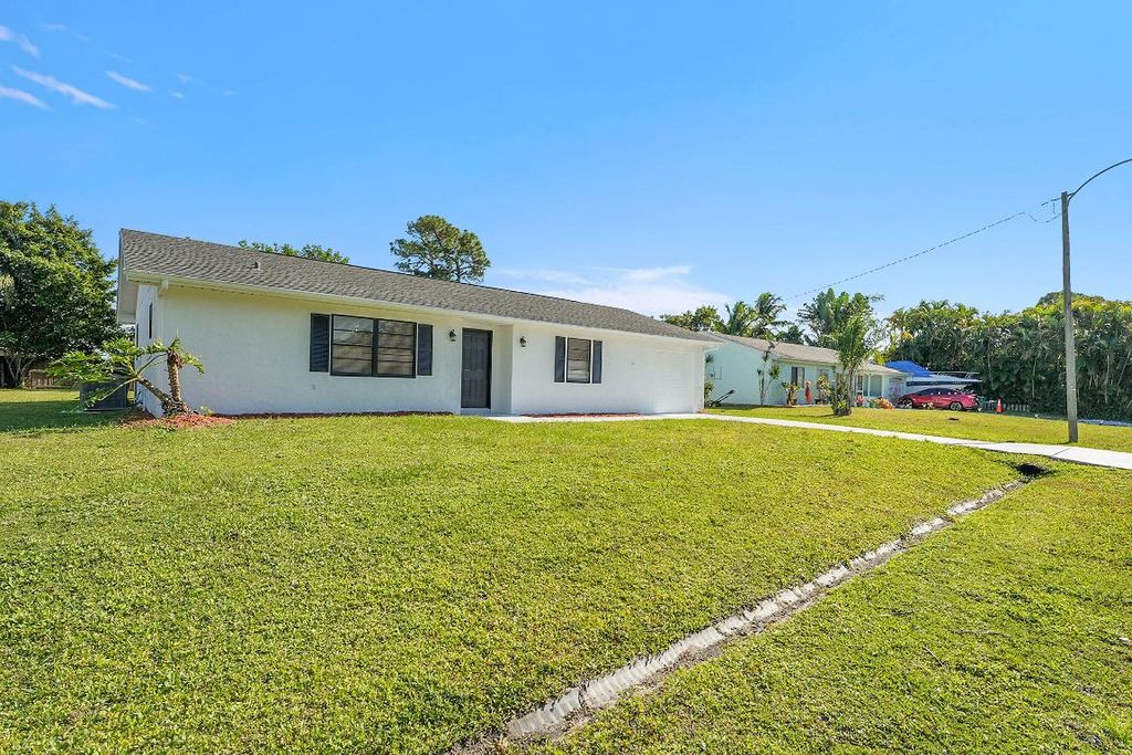 Photo of 2251 SE Holland Street, Port Saint Lucie, FL 34952 (MLS # R11141543)