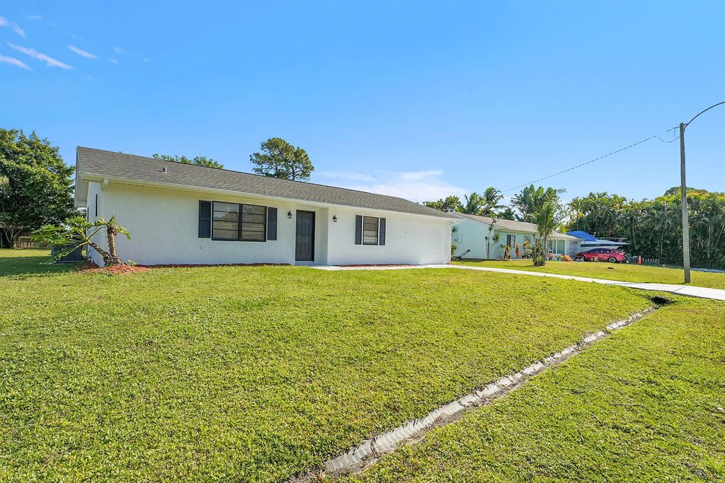 Photo of 2251 SE Holland Street, Port Saint Lucie, FL 34952 (MLS # R11141543)