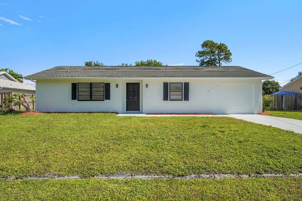 Photo of 2251 SE Holland Street, Port Saint Lucie, FL 34952 (MLS # R11141543)