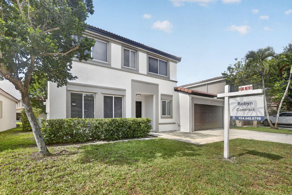 Photo of 10772 SW 14th Place, Davie, FL 33324 (MLS # B26032571)