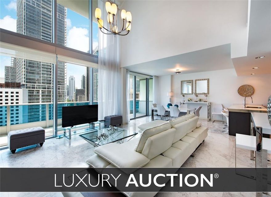 This and 5 other waterfront condos will be sold at LUXURY AUCTION on Oct 20, 2018! At least 2 units selling WITHOUT RESERVE! Remaining units sold Subject to Seller Confirmation. List price is FOR REFERENCE ONLY and has no bearing on auction pricing. Within the residence there are professional-grade appliances, Snaidero cabinetry, imported Italian marble floors, and floor-to-ceiling impact glass windows that offer incredible views of both Miami’s cityscape and the Biscayne Bay. Epic offers 24-hr. front desk/security, high-speed elevators, world-class restaurants, and multiple pools. The building houses the lavish Epic Kimpton hotel, which adds to the upscale lifestyle the building provides.