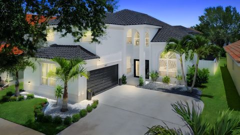 Photo of 6017 Newport Village Way, Lake Worth, FL 33463 (MLS # B26015163)