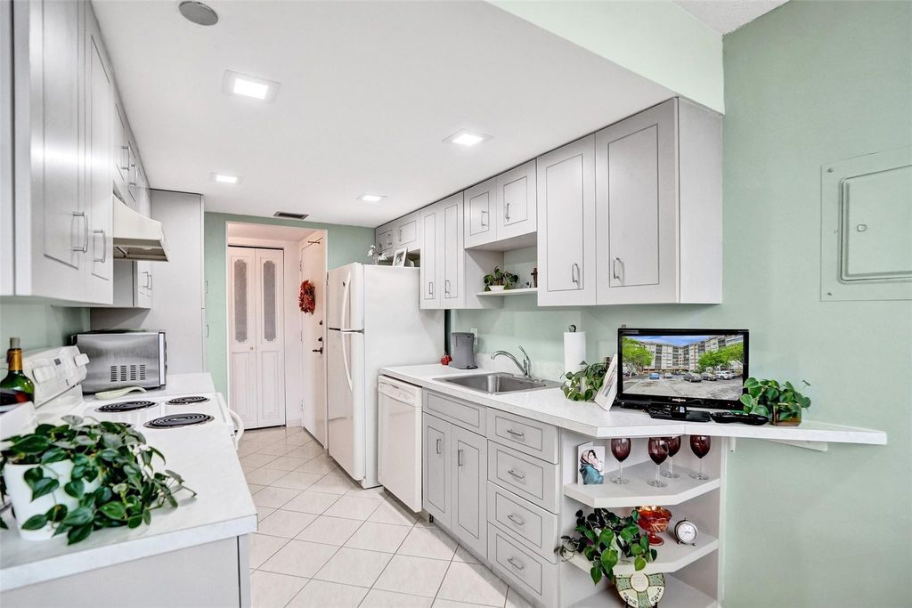 Photo of 1100 Saint Charles Place #612, Pembroke Pines, FL 33026 (MLS # F10519838)