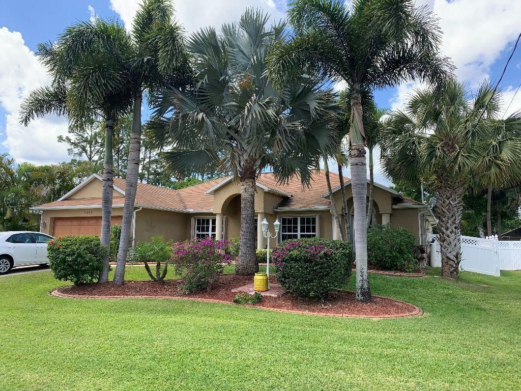 Photo of 2148 SW Hyacinth Street, Port Saint Lucie, FL 34953 (MLS # R10705473)