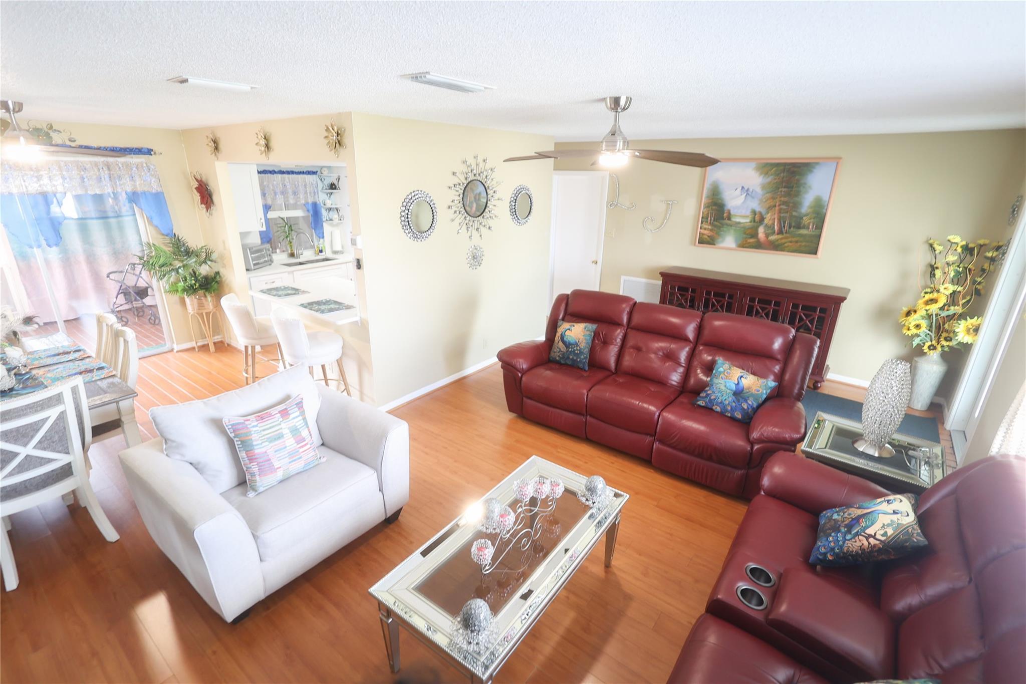 Single Family Home in Paradise Gardens, 55+ Community. This beautiful Corner home offers 2 bedrooms,2 bathroom, 1 Car garage. Walk in to the comfort of this spacious living room and go the kitchen where you will enjoy a beautifully remodeled area with Quartz counter tops, back splash, New Garbage Disposal, New kitchen Appliances-Fridge with icemaker. The 2 Bathrooms are completely remodeled, New Hurricane impact windows all around the house and front door, Rolling down shutters in porch area. Roof:2021. AC:2020, Water heater:2017. Large living room 21x13. Large screened porch. Located in Margate, in the community you can enjoy the Community Pool and Club house. You will find tranquility and charm in this house and the best part is hat it's "ready to move in" ! HOA requires 700 Fico Score
