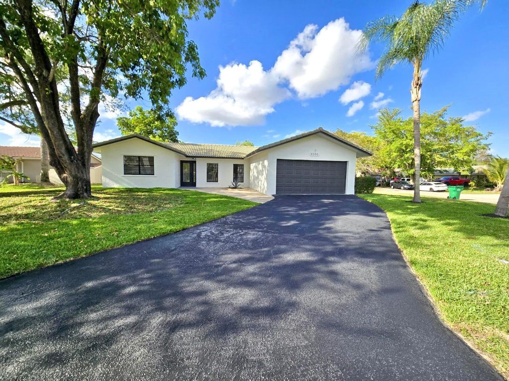 Photo of 4060 NW 115th Avenue, Coral Springs, FL 33065 (MLS # F10507735)
