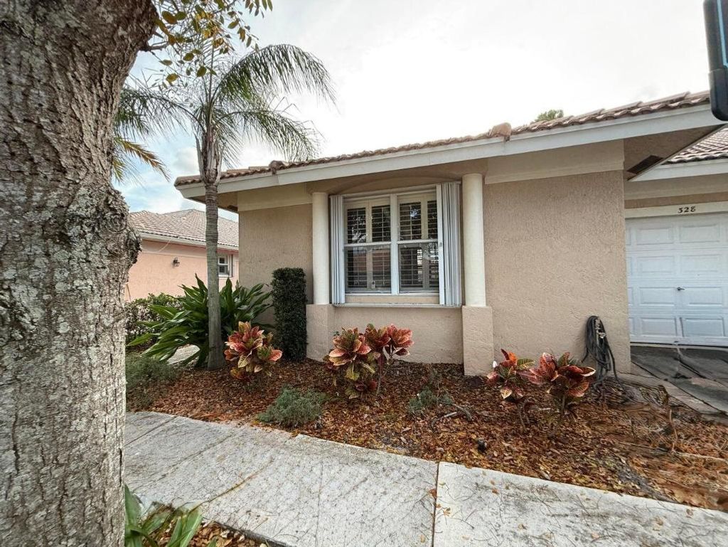 Photo of 328 W Coral Trace Circle, Delray Beach, FL 33445 (MLS # R11152341)