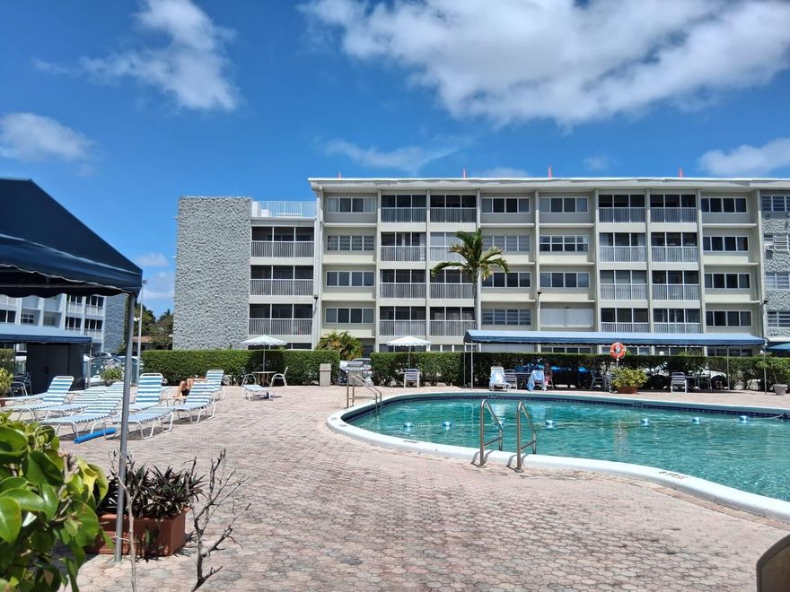 Unbeatable location—across from Gulfstream Racetrack & Casino, just 10 minutes to the beach, and close to Aventura Mall, dining, supermarkets, and top medical facilities. Well maintained secure 55+ Whether for year-round living or a seasonal escape, this condo offers the perfect South Florida lifestyle., pool, clubhouse, fitness center. "NEW IMPACT WINDOWS" and area enlarged as the balcony was enclosed with impact glass windows.  Homeowner created a guest bedroom on the living room as there is plenty of space, divided by movable cabinets. Property can be rented after 1 year