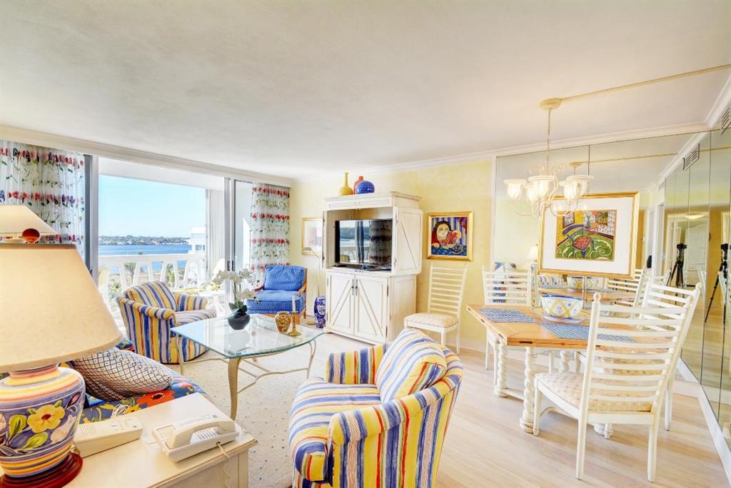 First time in the rental market! Penthouse floor with water views from everyroom. Spectacular Sunsets abound at The President of Palm Beach nestled between the ocean and Intracoastal Waterway. This top floor 2 Bedroom 2 Bath Penthouse unit has been completely updated with new kitchen & bathrooms & offers hardwood floors, tile & crown molding throughout; NEW AC & hot water heater & NEW Hurricane impact glass sliders to huge, extended balcony and NEW hurricane grade entrance door. Beautifully furnished! The building boasts newly designed furnished lobbies on all seven floors and the resort-style amenities include a 24 hr door person, elegant and lushly landscaped pool area and boat dock.