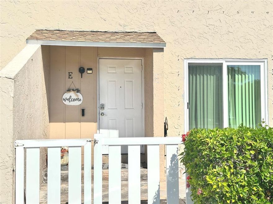 ALL AGES COMMUNITY | FHA WELCOME | POSSIBLE FHA ASSUMABLE LOAN ~2.7%Beautifully updated 3-bedroom, 2.5-bath townhome located in the desirable Townhomes of Oriole community. This move-in-ready home features fresh interior paint and a newly renovated primary bathroom, giving the home a clean, modern feel.Highlights include laminate flooring throughout, new hurricane impact windows, and full-size washer and dryer. The kitchen opens to the dining & family room, creating a comfortable open layout.A rare enclosed Florida room with additional storage extends the living space, while the private fenced patio is perfect for relaxing or entertaining. The open front porch adds charm and curb appeal.HOA includes water, trash, lawn care, two pools, clubhouse, tot lot, & basketball court.