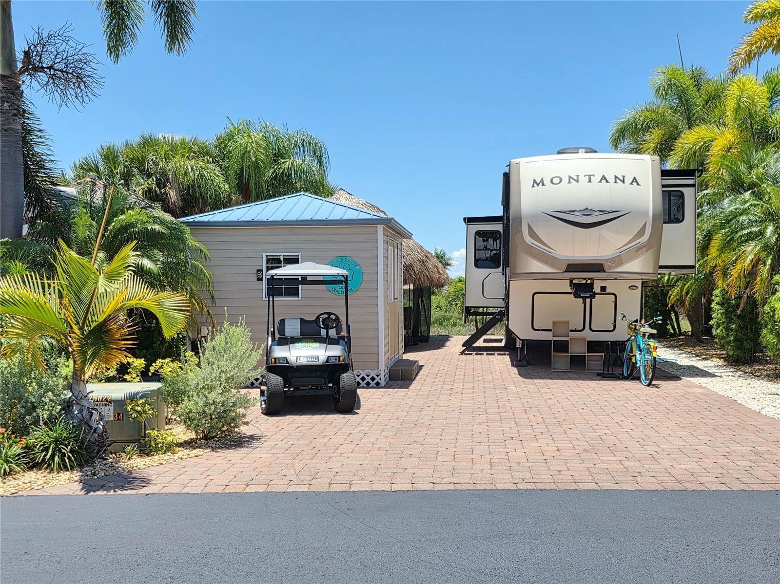 SILVER PALMS 5 STAR RV RESORT - This beautiful property is on the preserve that is teeming with wildlife in the rainy season. The landscaping is superb. Sitting in your Tiki in the evening watching the spectacular sunsets, the Tiki is all screen in for your comfort. The Tiki is 10x28, Casita is 10x12 and you can build to your own specifications. The property includes a 2020 Montana 5th Wheel. It has hydraulic jacks, pantry, washer/dryer. This is an active resort with 9 pickleball courts, clubhouse, heated pool, Jacuzzi, poolside bar and grill, fitness center, billiards room, fitness center, card room and much more. Golf cart comes with the package, all six batteries were replaced in December 2024. Roof on camper redone in December 2024. Right across from the clubhouse. Perfect location.