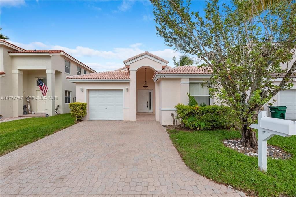 Photo of 6222 Flores Del Mar, Margate, FL 33063 (MLS # B26022392)