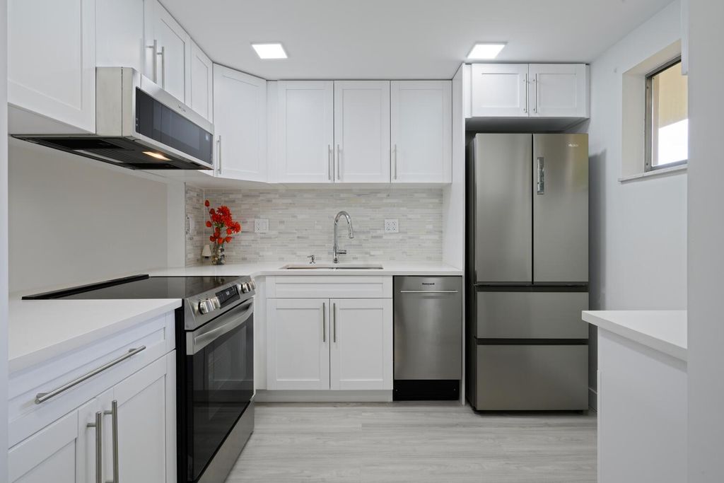 Photo of 2811 S Garden Drive #110, Palm Springs, FL 33461 (MLS # R11128818)