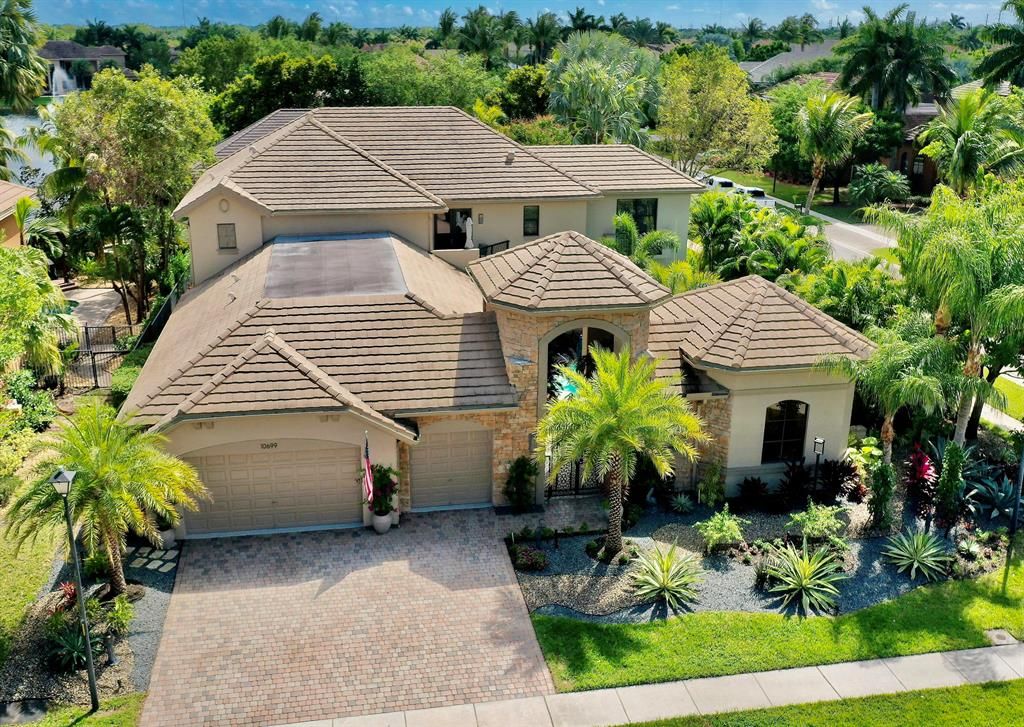 Photo of 10699 Versailles Boulevard, Wellington, FL 33449 (MLS # R10700697)