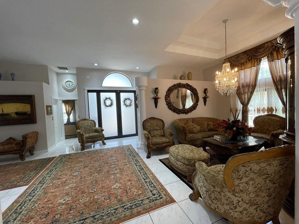 Photo of 4999 Chardonnay Drive, Coral Springs, FL 33067 (MLS # F10436352)