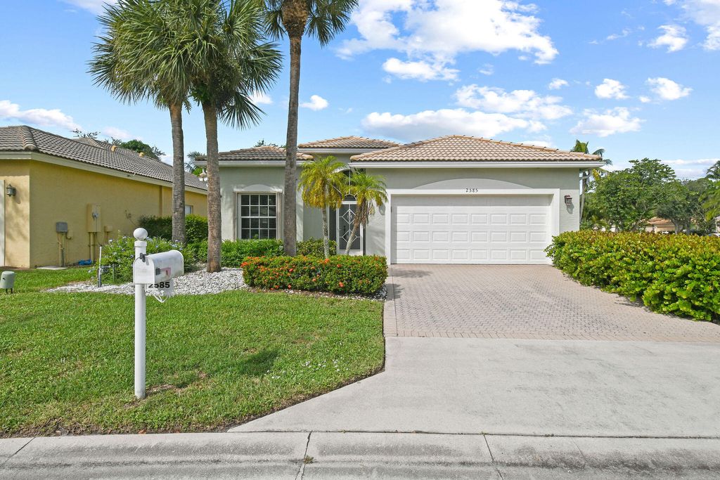 Photo of 2585 San Andros, West Palm Beach, FL 33411 (MLS # R11126320)