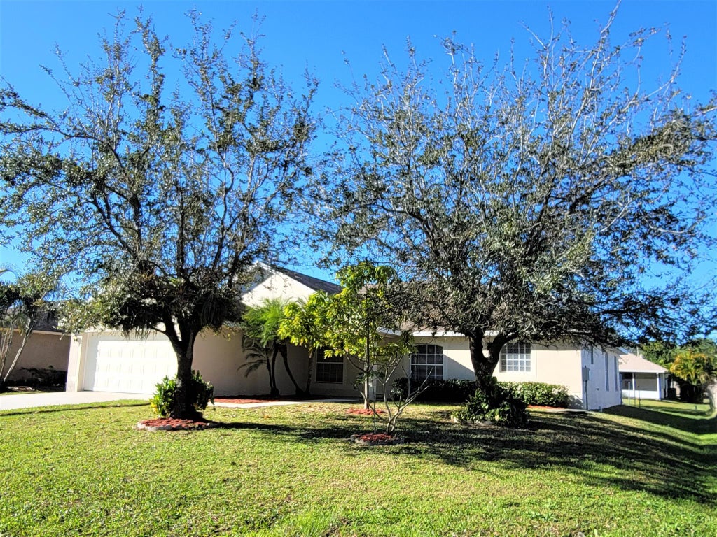 Photo of 1932 SW Victor Lane, Port Saint Lucie, FL 34984 (MLS # R11055214)