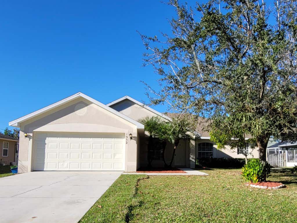 Photo of 1932 SW Victor Lane, Port Saint Lucie, FL 34984 (MLS # R11055214)