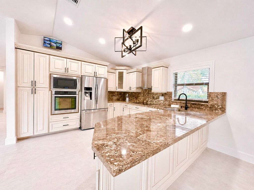 Photo of 4823 NW 91st Way, Coral Springs, FL 33067 (MLS # B26022052)