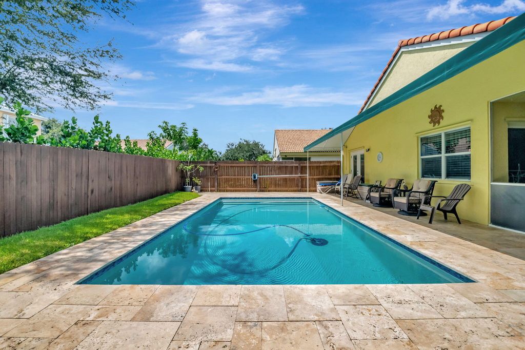 Photo of 4050 Laurelwood Lane, Delray Beach, FL 33445 (MLS # R11020459)