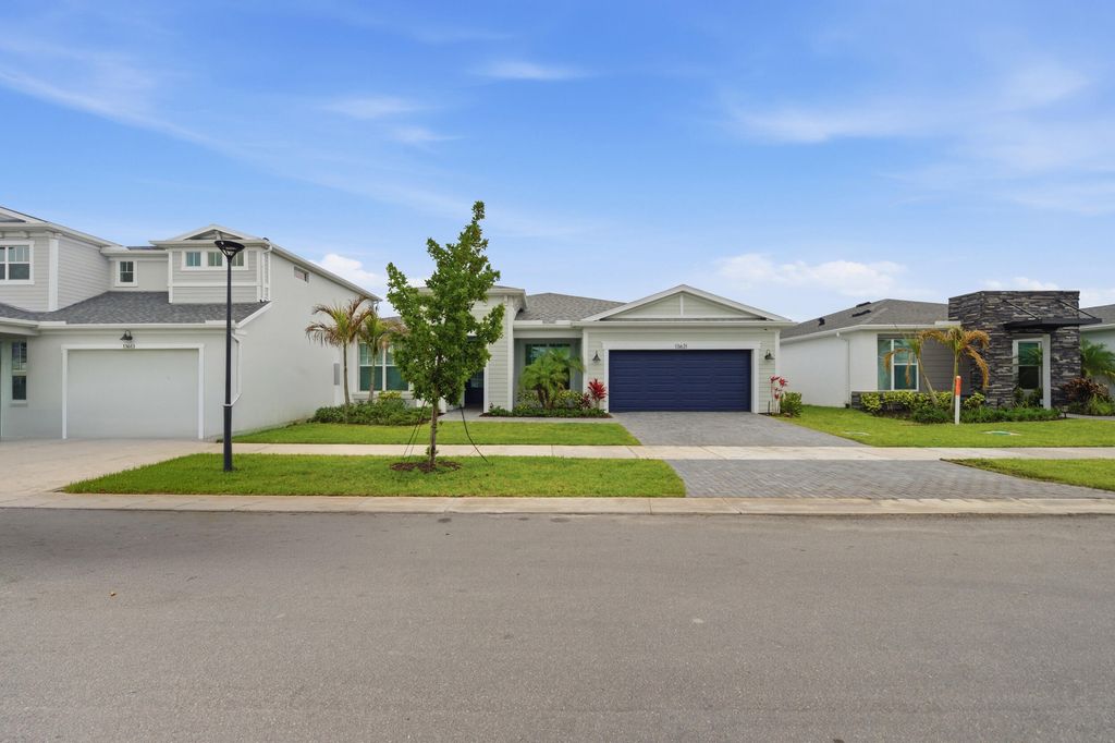Photo of 13621 SW Bally Drive, Port Saint Lucie, FL 34987 (MLS # B26019182)