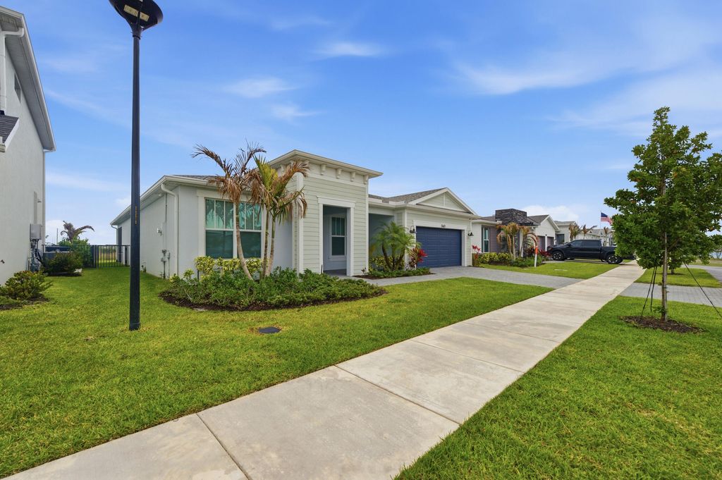 Photo of 13621 SW Bally Drive, Port Saint Lucie, FL 34987 (MLS # B26019182)