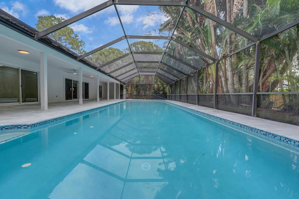 Photo of 16143 78th Drive N, Palm Beach Gardens, FL 33418 (MLS # R10939758)