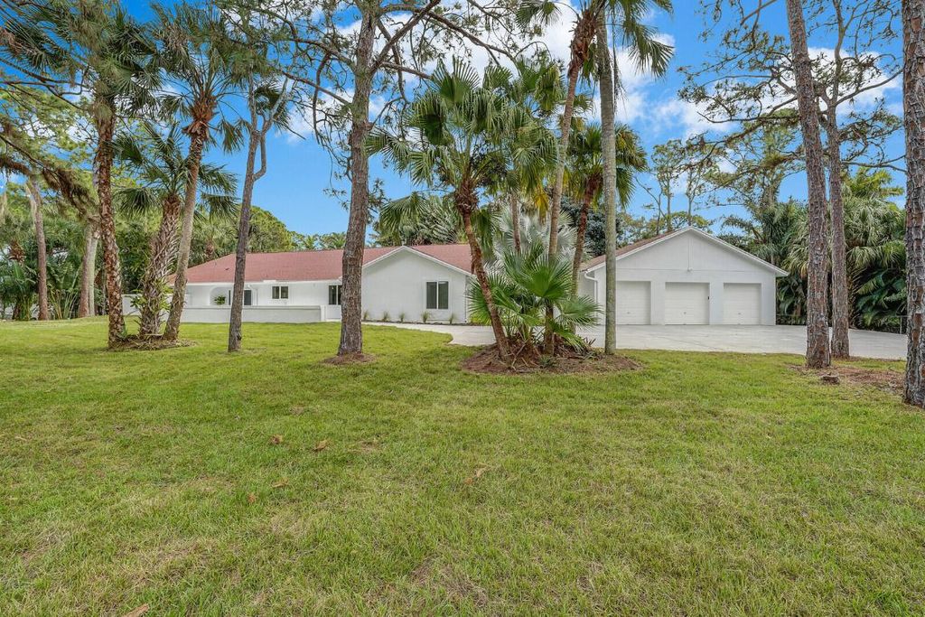 Photo of 16143 78th Drive N, Palm Beach Gardens, FL 33418 (MLS # R10939758)