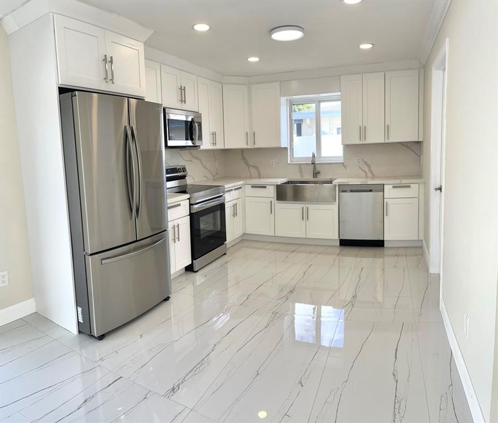 Photo of 4675 Betelnut Street, Boca Raton, FL 33428 (MLS # R10861905)