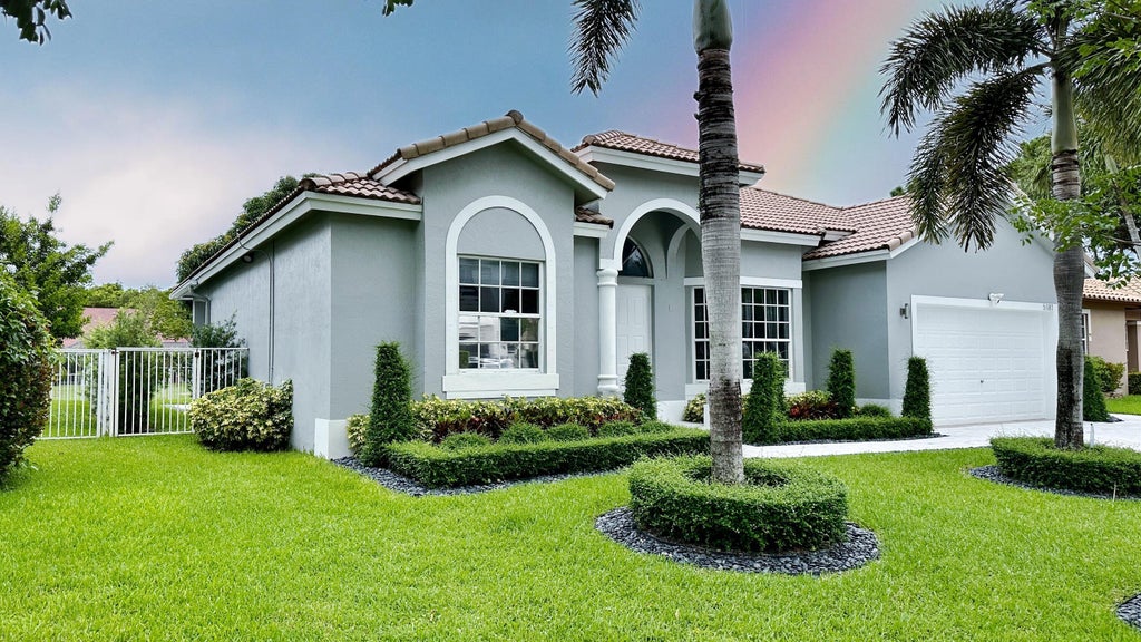 Photo of 5181 NW 50TH Terrace, Coconut Creek, FL 33073 (MLS # B26060298)