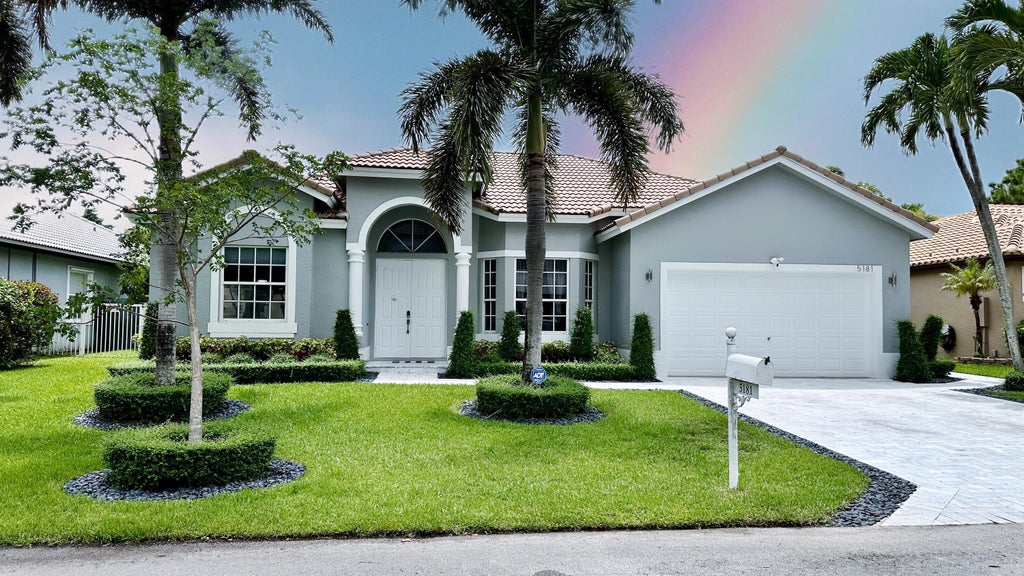 Photo of 5181 NW 50TH Terrace, Coconut Creek, FL 33073 (MLS # B26060298)