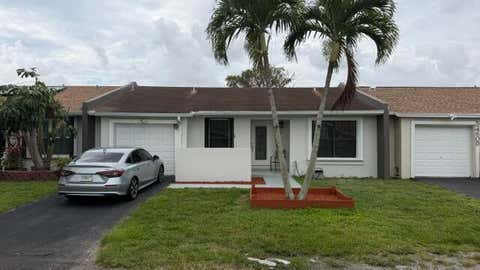 Photo of 5460 S Lakewood Cir CIR S #C, Margate, FL 33063 (MLS # B26039140)