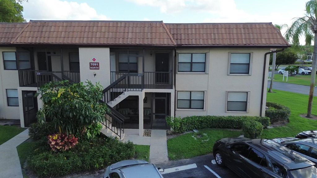 Photo of 7091 Golf Colony Court #203, Lake Worth, FL 33467 (MLS # R10990816)