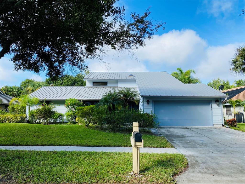 Photo of 18820 Misty Lake Drive, Jupiter, FL 33458 (MLS # R10746283)