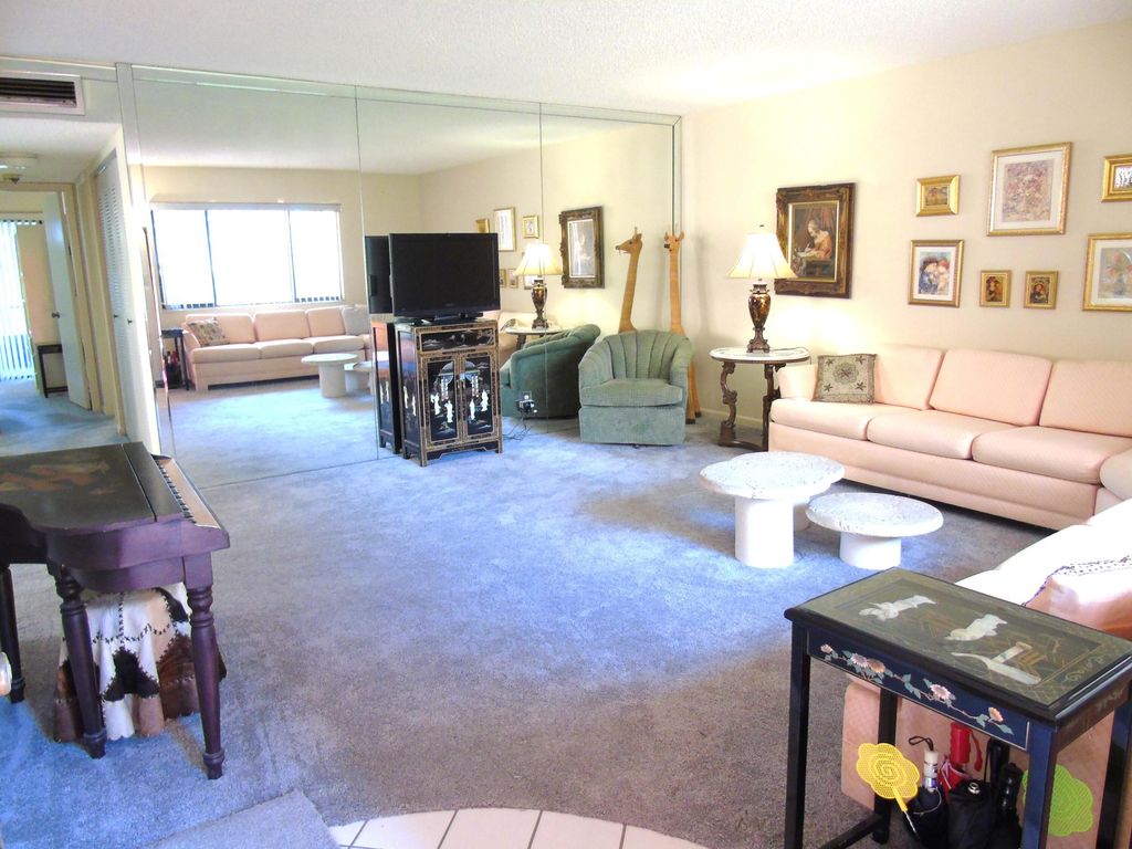 Photo of 15216 Lakes Of Delray Boulevard #126, Delray Beach, FL 33484 (MLS # B26044937)