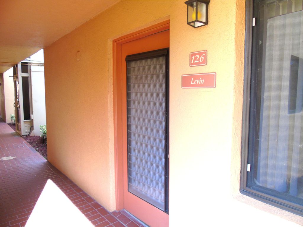 Photo of 15216 Lakes Of Delray Boulevard #126, Delray Beach, FL 33484 (MLS # B26044937)