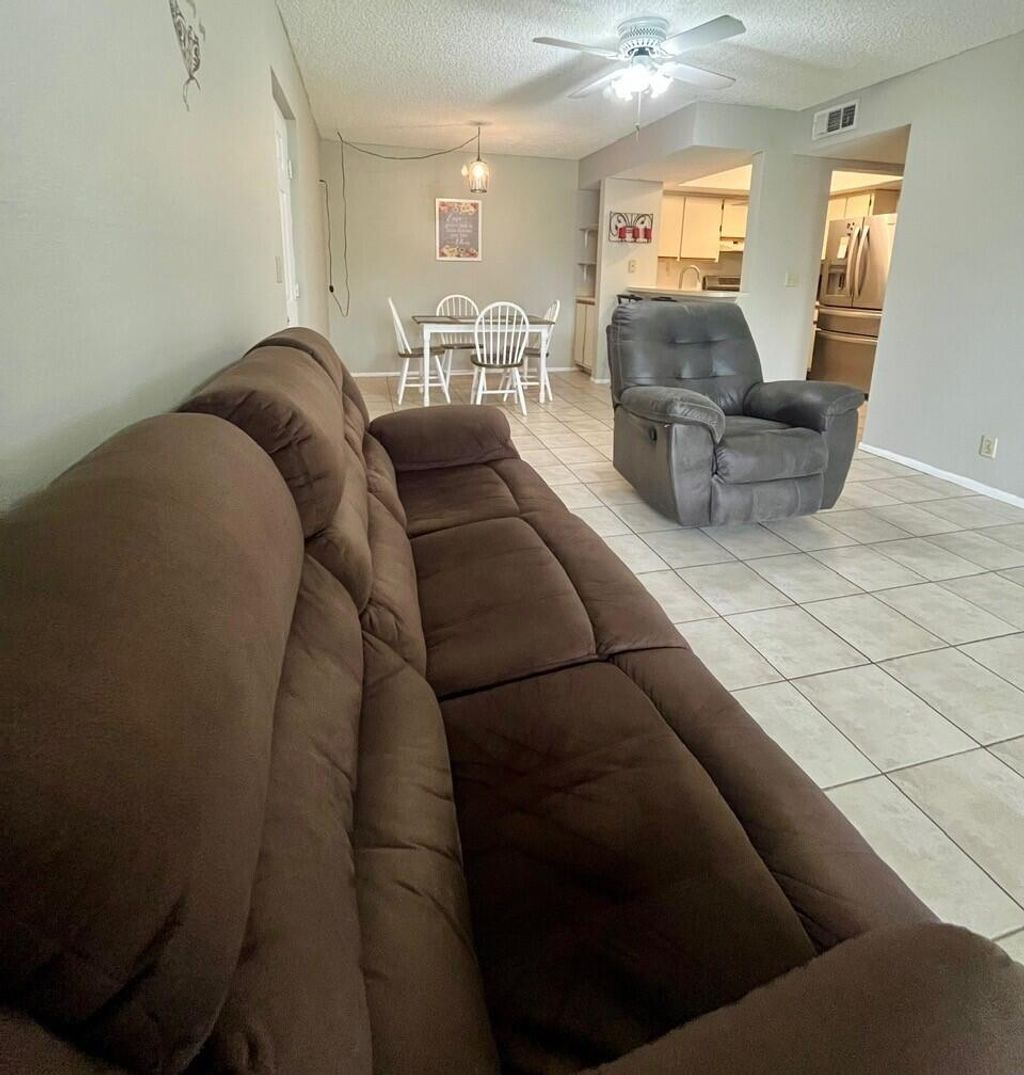 Photo of 1537 SE Royal Green Circle #E204, Port Saint Lucie, FL 34952 (MLS # B26030159)
