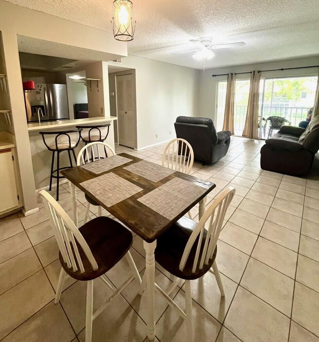 Photo of 1537 SE Royal Green Circle #E204, Port Saint Lucie, FL 34952 (MLS # B26030159)