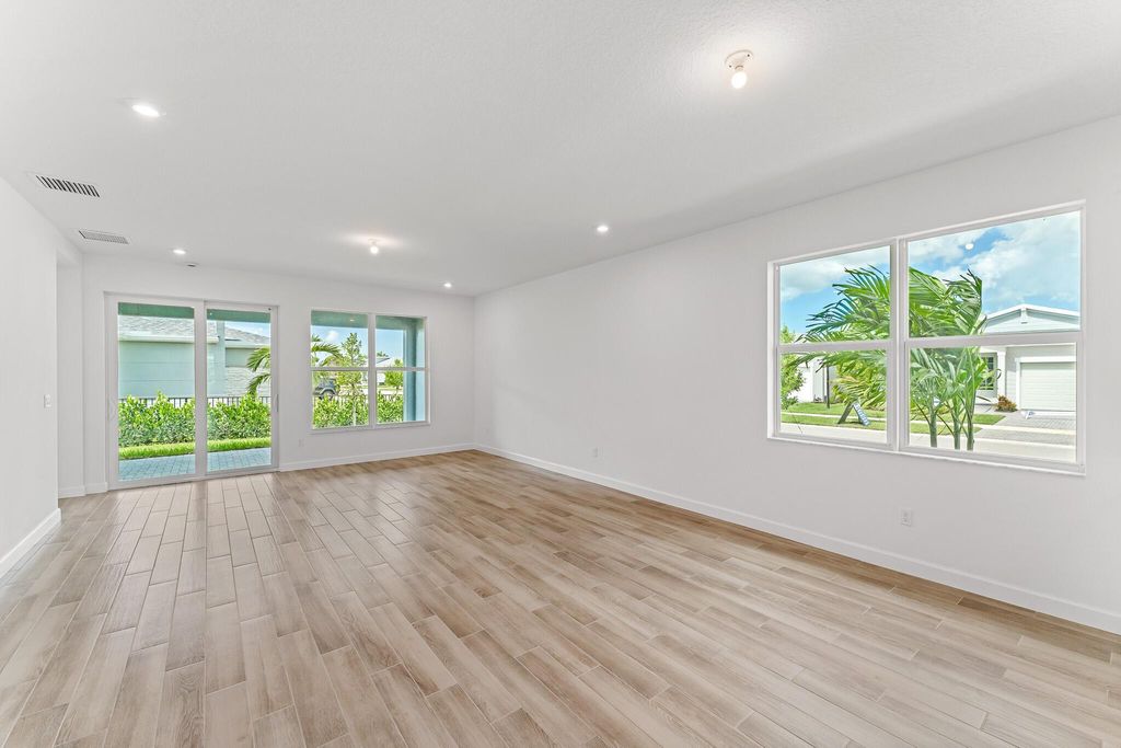 Photo of 9547 SW Indra Way, Port Saint Lucie, FL 34987 (MLS # R11109568)
