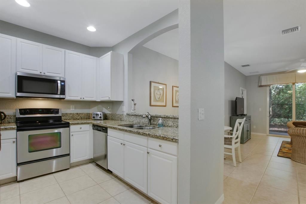 Photo of 4871 Bonsai Circle #101, Palm Beach Gardens, FL 33418 (MLS # R10738102)