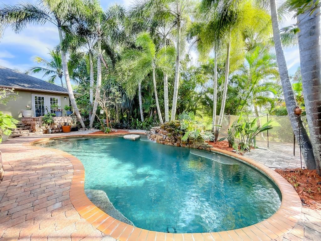 Photo of 1030 SE Walters Terrace, Port Saint Lucie, FL 34983 (MLS # R10932609)