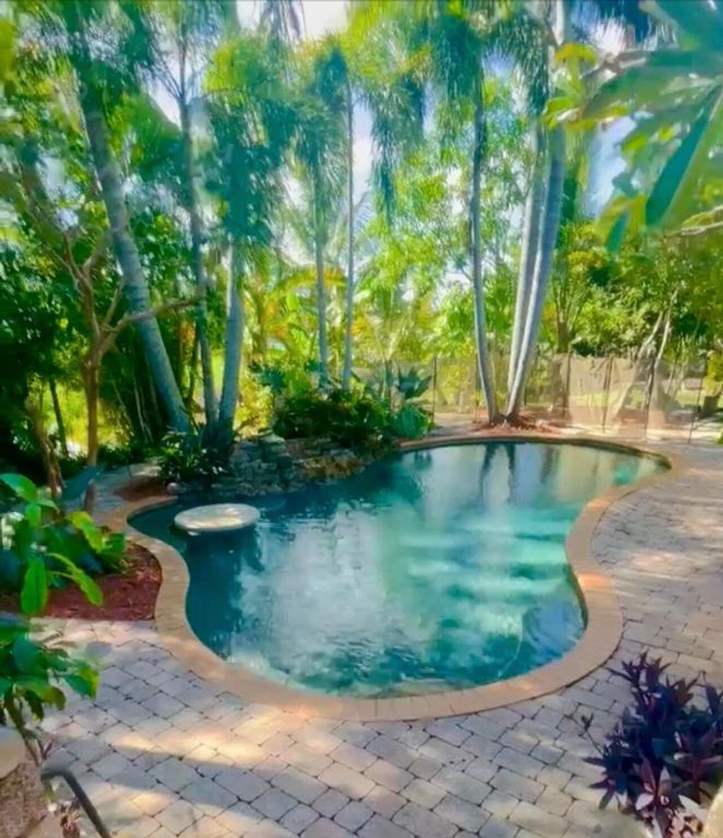 Photo of 1030 SE Walters Terrace, Port Saint Lucie, FL 34983 (MLS # R10932609)