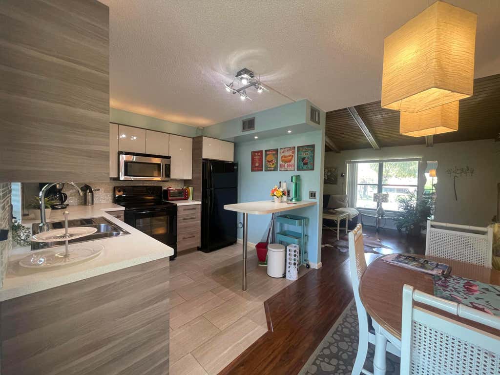 Photo of 2 Via De Casas Sur #205, Boynton Beach, FL 33426 (MLS # R10906985)