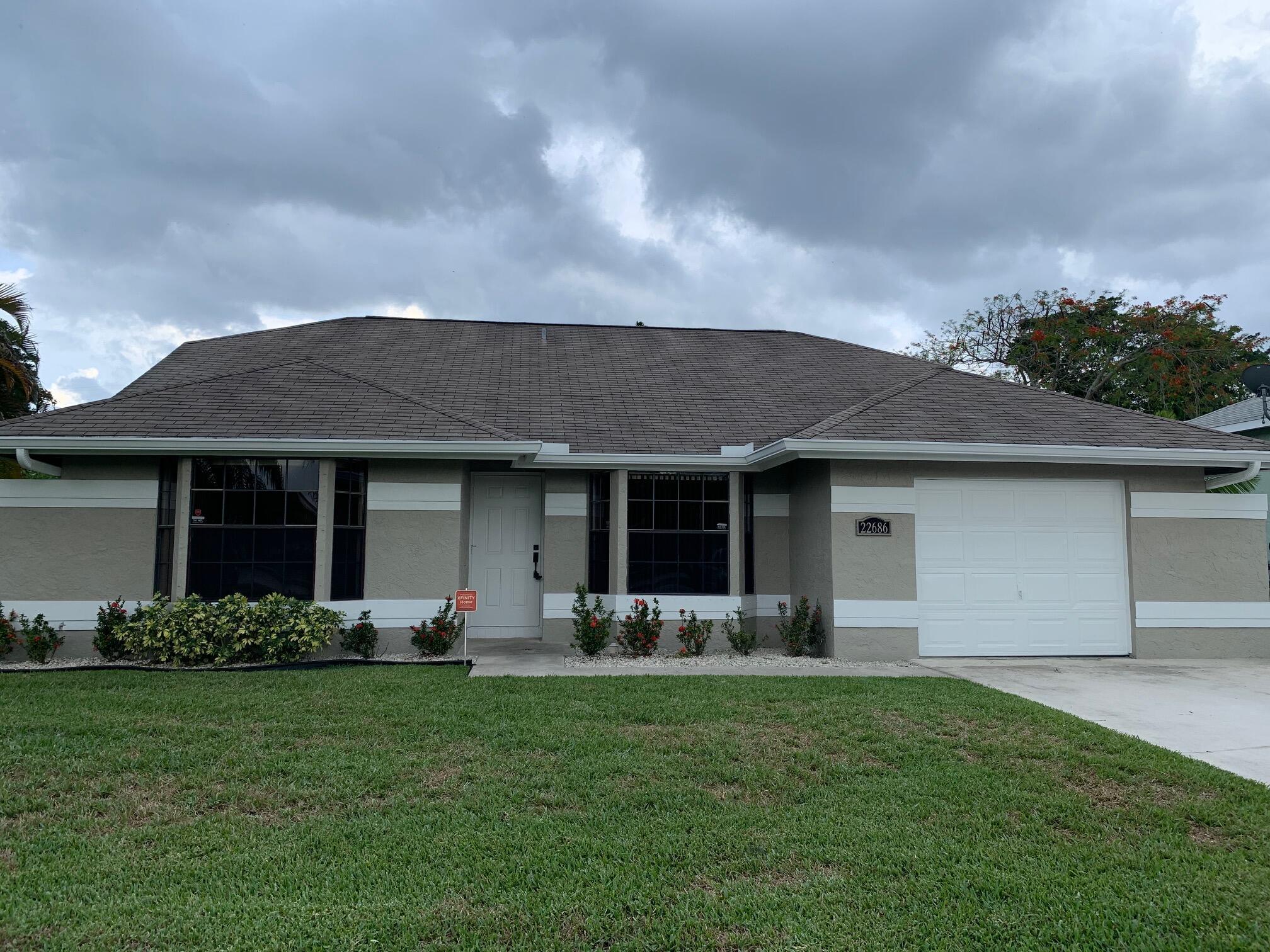 Renovated 3 bedroom, 2 bath home for rent in desired West Boca location. Boca Winds - Ashley Park. Remodeled kitchen with white shaker cabinets, & wood grained tile floor. Open concept floor plan with vaulted ceilings. Single car attached garage. Oversized private backyard. Solar powered A/C, providing low electric bill. GREAT LOCATION & zoned for A Rated Schools: Walking distance to Waters Edge Elementary, Loggers Run Middle School & West Boca High School. Access to community tennis courts, basketball courts, kids playground & park. Available for April move in upon HOA background approval. Owner covers lawn service. Owner manages property & lives locally.
