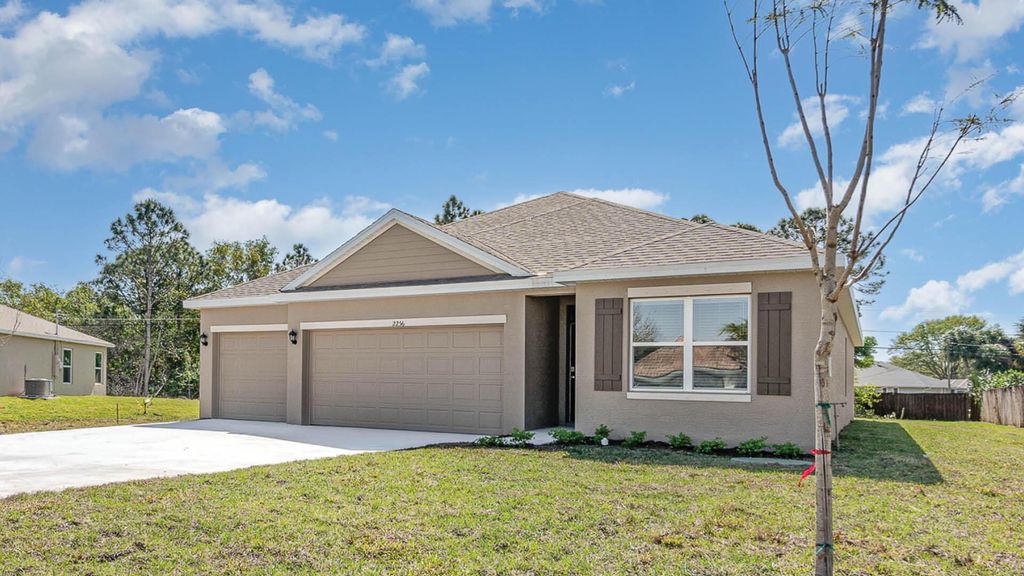 Photo of 1457 SW Edinburgh Drive, Port Saint Lucie, FL 34953 (MLS # R10970095)