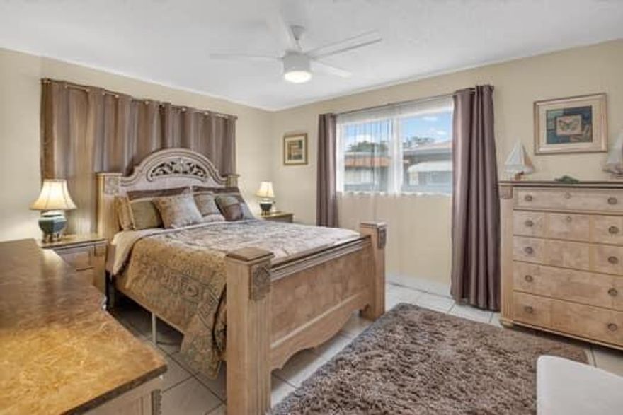 Owner Occupied. Please be reasonable on showings. Short notice is ok.  LA Accompany. This Villa is a beauty!! Location! 55+ Community, Low HOA, Attached Carport with a Laundry Room with storage. Beautiful maintained. New AC 5/24/2022. Hot Water Heater 2015. New Roof 2018. Electric Panel 2024. As you can see the owners took immaculate care of their home. You must own 2 years before renting. 9 Pools in Country Manors. Walk to the pool which is heated. Mailboxes are by the pool.  Happy Hour on Thursdays. Visit your neighbors and enjoy some home cooked food. Active Clubhouse, Live music at events with great food. Furniture is negotiale. Blinds throughout. One Bath features step in shower. The other bath features tub/shower. 
Home is very quiet. Ready to move in.
Great Location i-95 or tpk