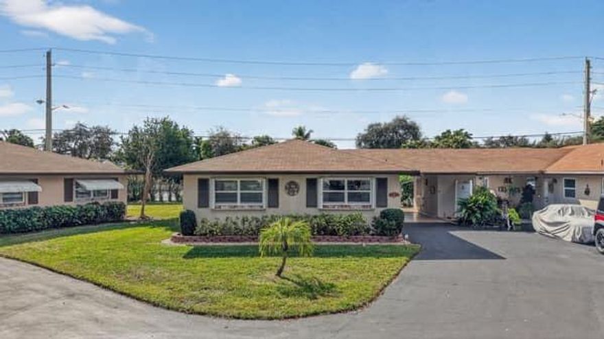 Owner Occupied. Please be reasonable on showings. Short notice is ok.  LA Accompany. This Villa is a beauty!! Location! 55+ Community, Low HOA, Attached Carport with a Laundry Room with storage. Beautiful maintained. New AC 5/24/2022. Hot Water Heater 2015. New Roof 2018. Electric Panel 2024. As you can see the owners took immaculate care of their home. You must own 2 years before renting. 9 Pools in Country Manors. Walk to the pool which is heated. Mailboxes are by the pool.  Happy Hour on Thursdays. Visit your neighbors and enjoy some home cooked food. Active Clubhouse, Live music at events with great food. Furniture is negotiale. Blinds throughout. One Bath features step in shower. The other bath features tub/shower. 
Home is very quiet. Ready to move in.
Great Location i-95 or tpk